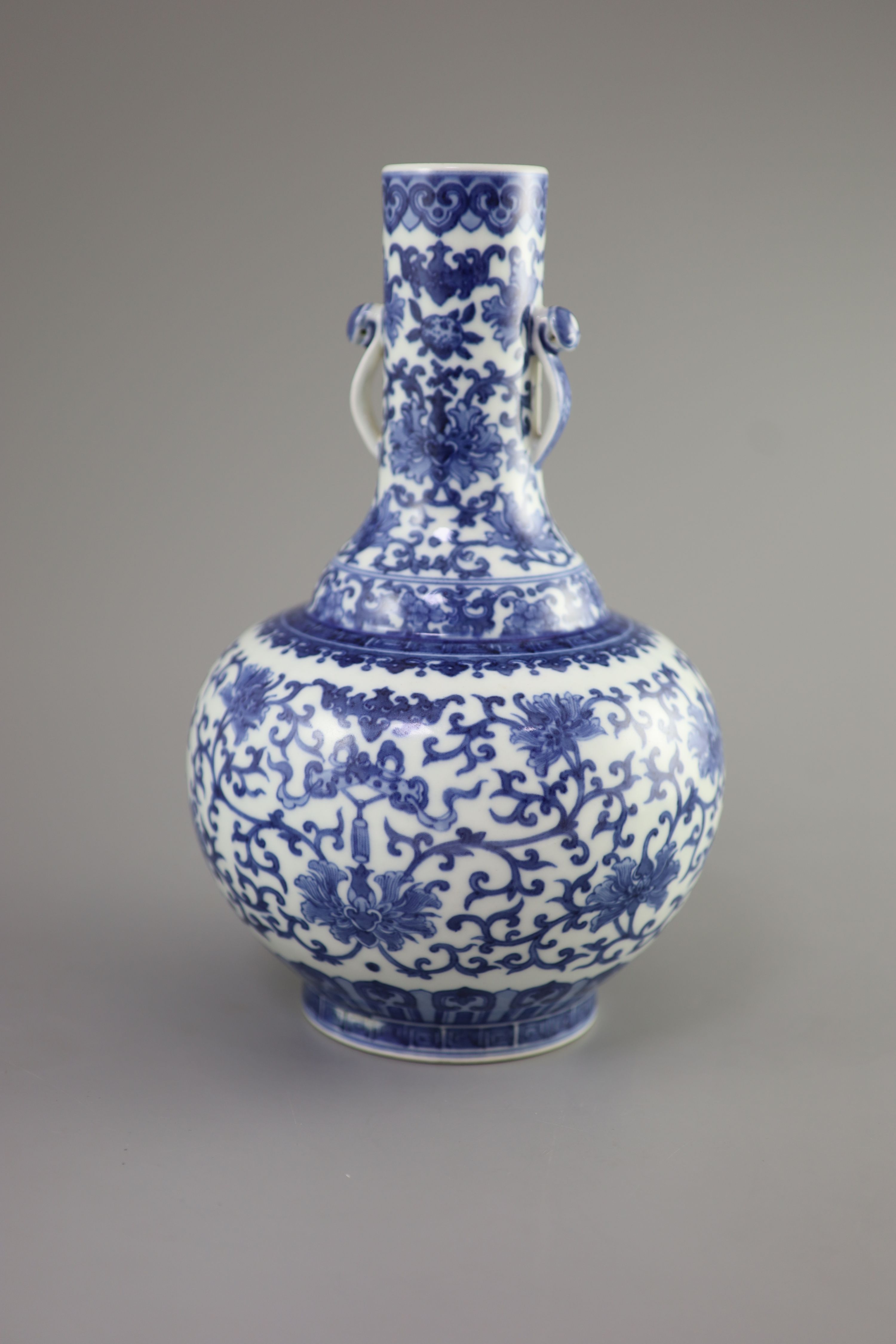 A Chinese blue and white bottle vase, Daoguang seal mark and possibly of the period, 28.5cm high